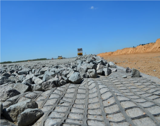 Combination grid made of polyester geogrid 50/50 kN/m 25x25 mm, PP fleece GRK-3 150 g/m²